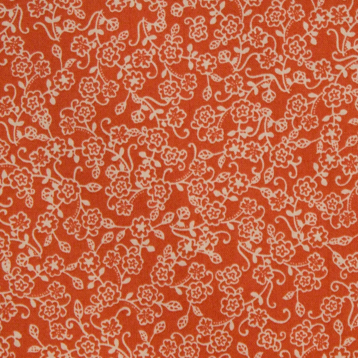 Katoen oranje met bloemenpatroon